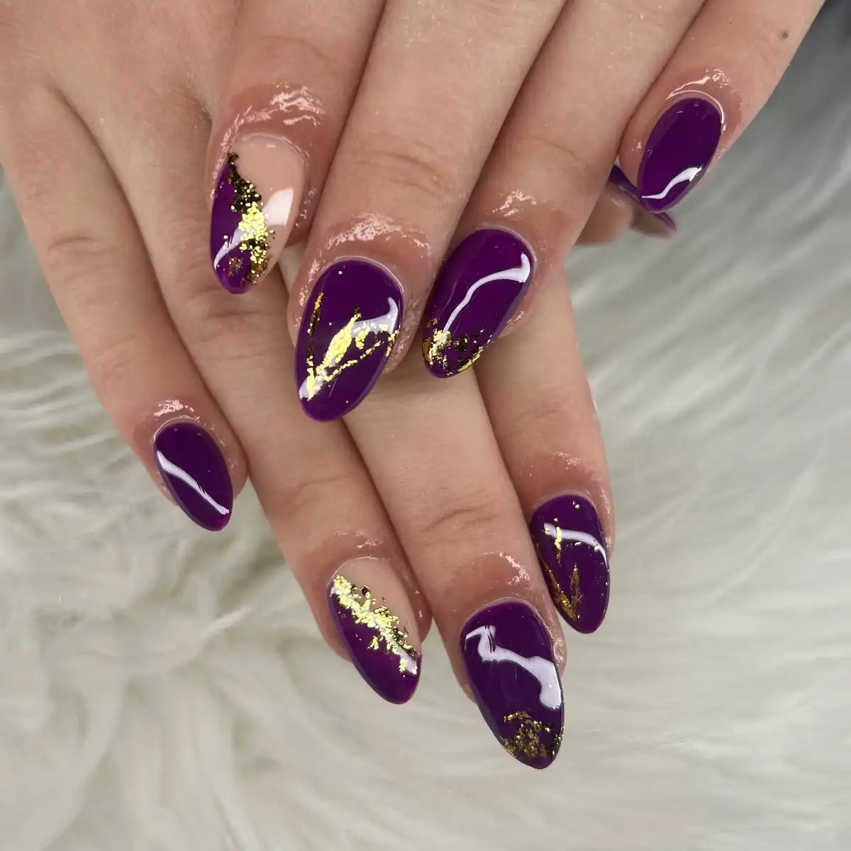 Glossy deep purple with gold foil accents