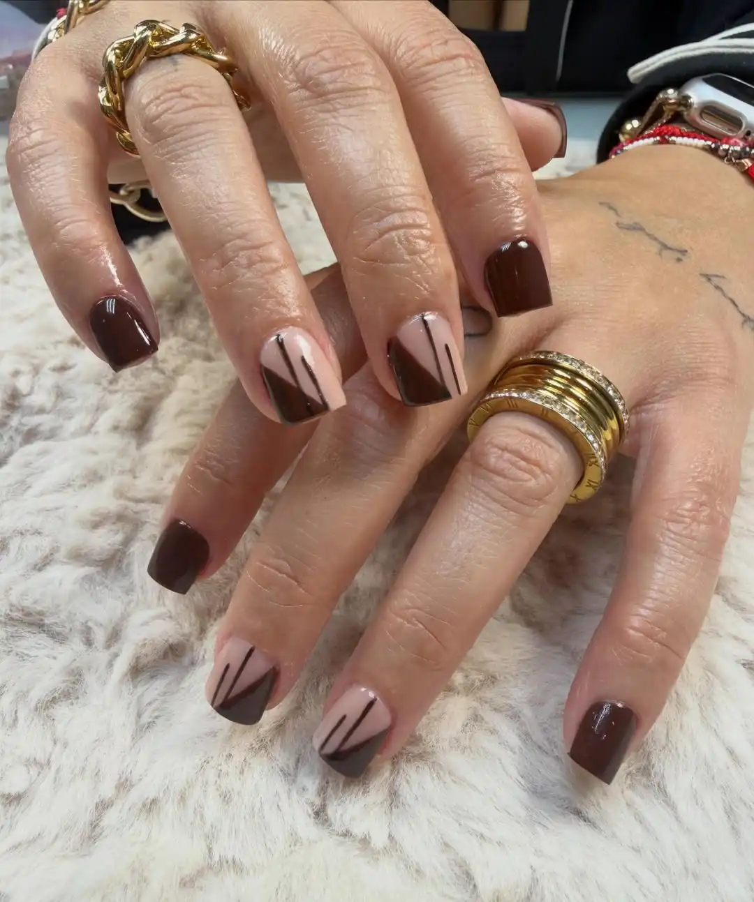 Dark brown solids with nude geometric blocks and lines