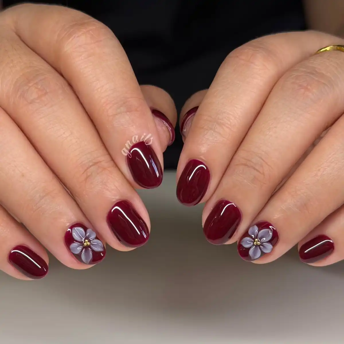 Solid maroon with 3D floral accents