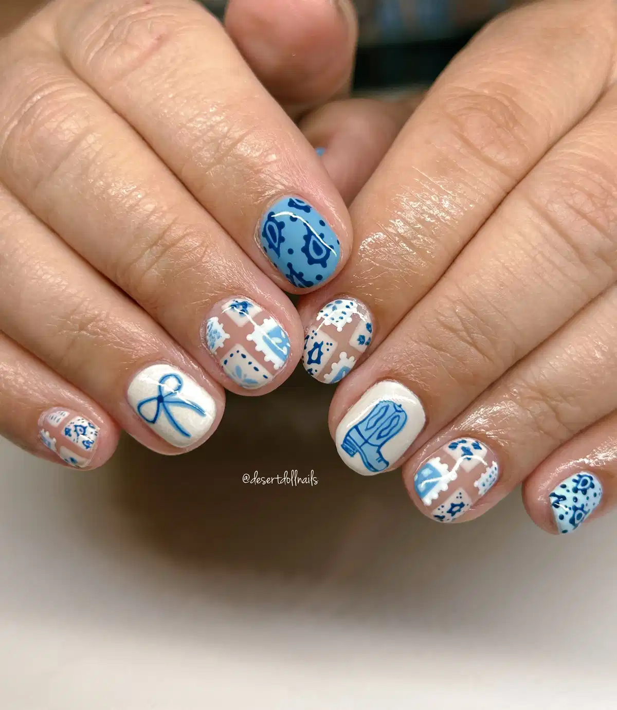 Blue-and-white western icons with bandana-style patterns