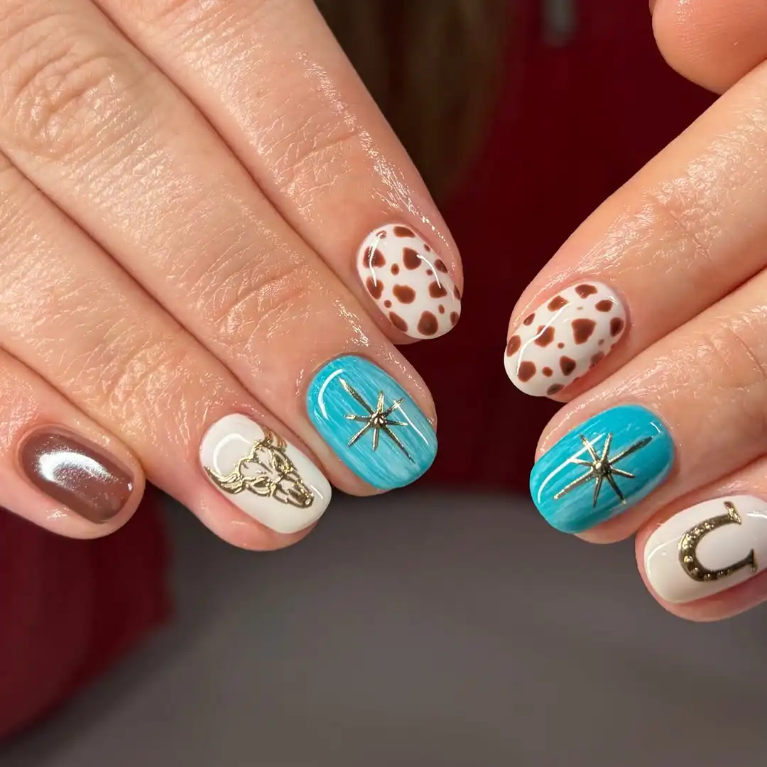 Turquoise starbursts with gold western icons and cow print