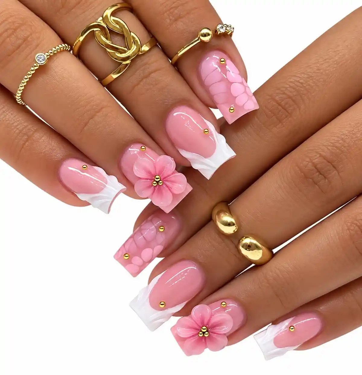 Glossy pink French tips with 3D flowers and gold studs