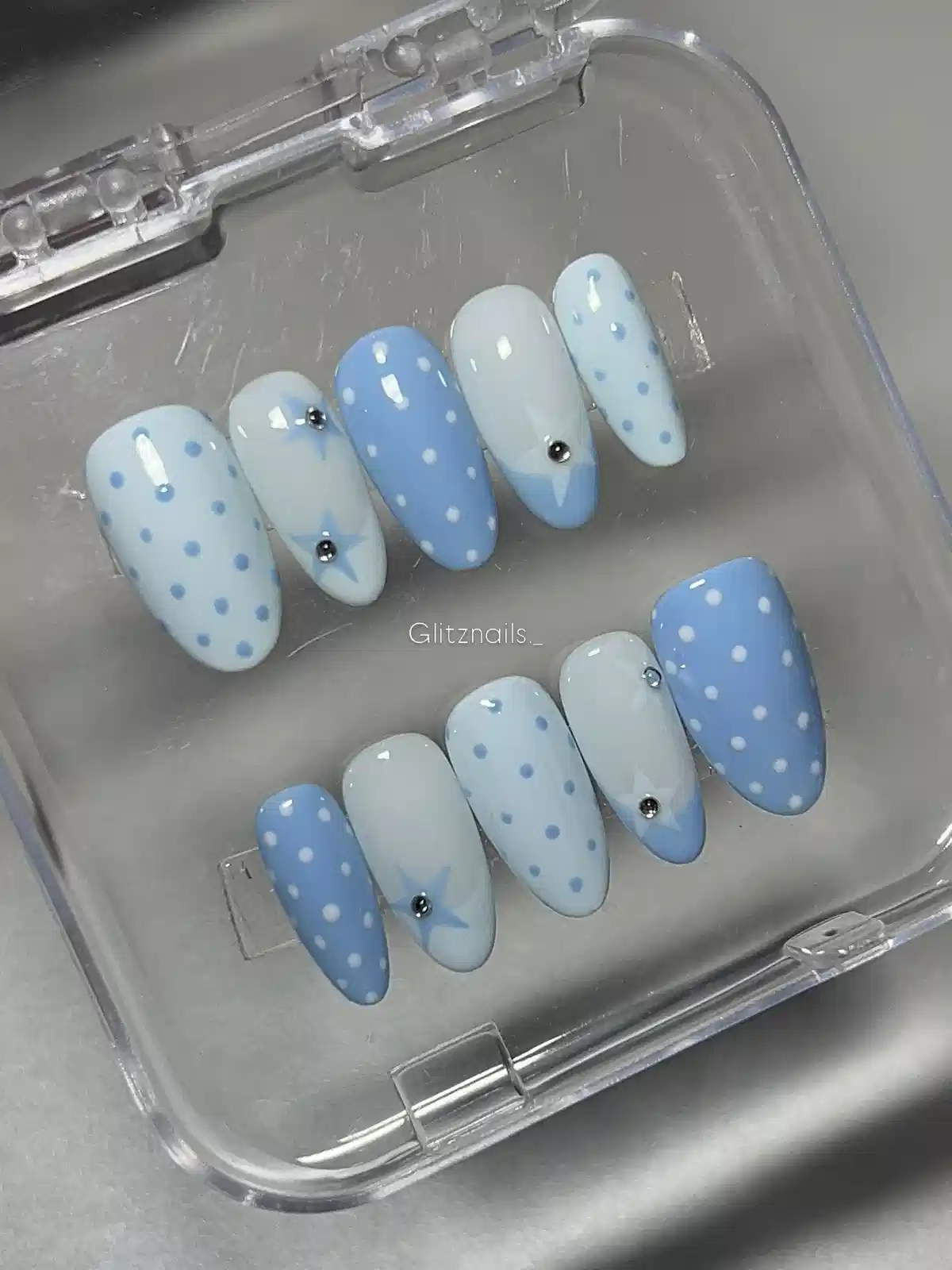Blue-and-white polka dot set with small gem accents