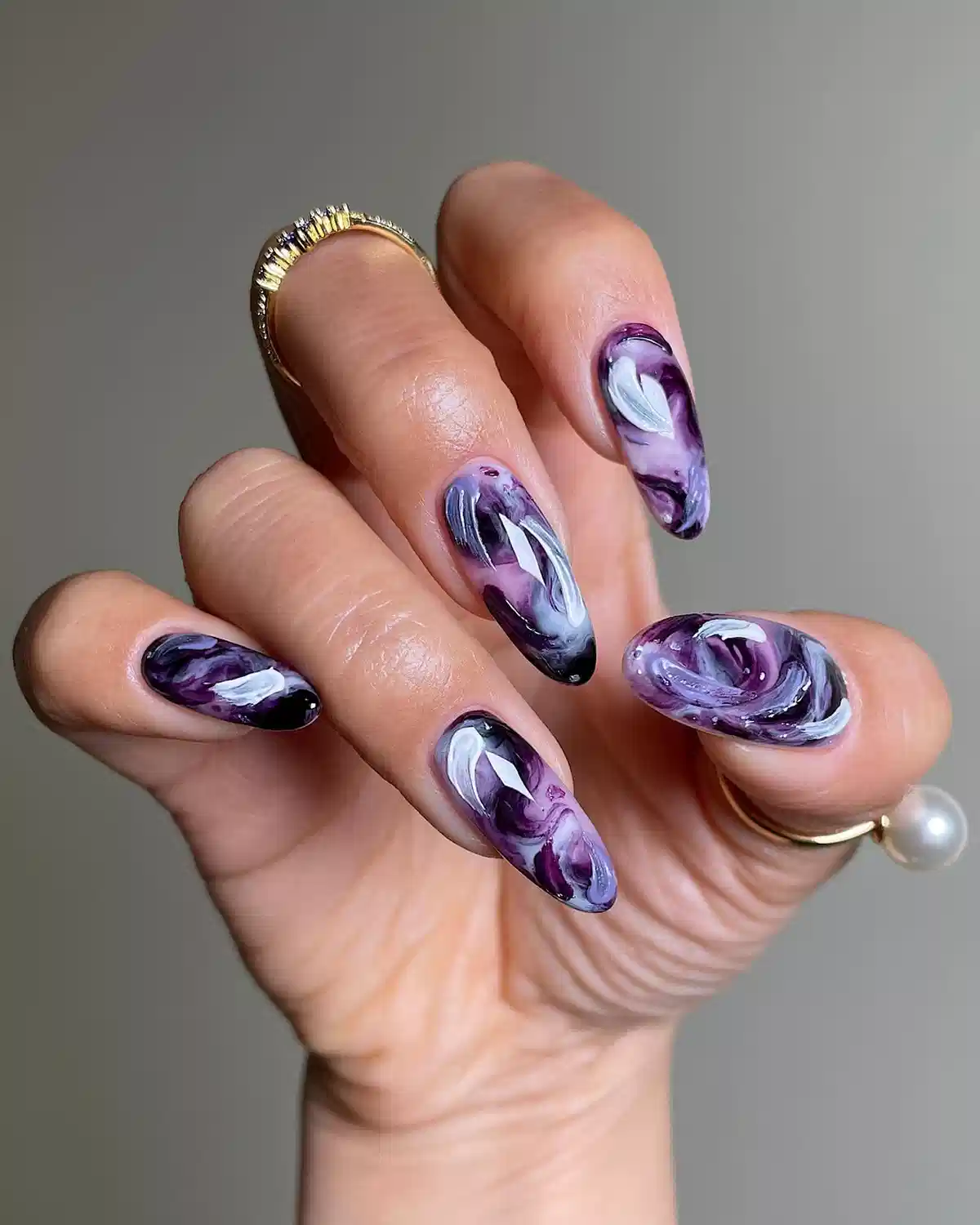 Purple-black-white marble swirl nails