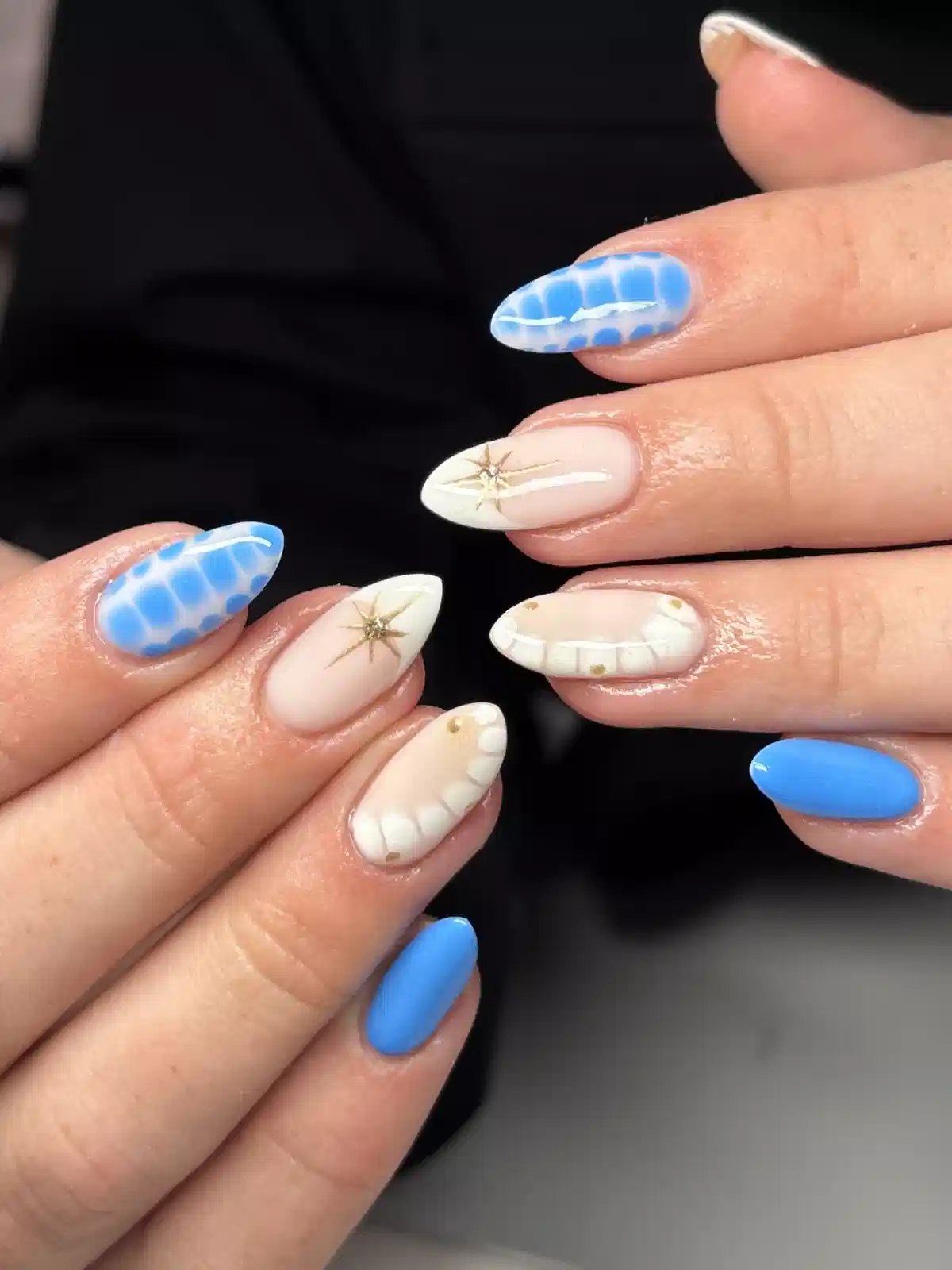 Blue solids and mosaic accents with gold starbursts