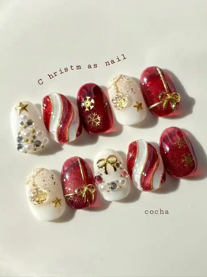 Red glitter and white set with gold bows, snowflakes, stars, and rhinestone clusters