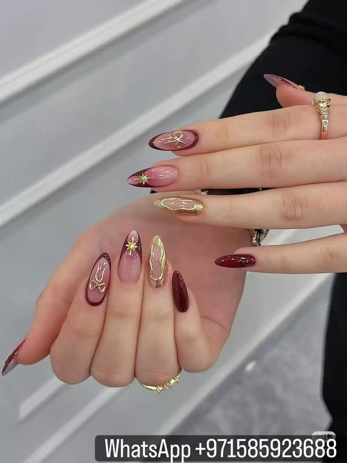 Burgundy ombré with gold bow and star accents