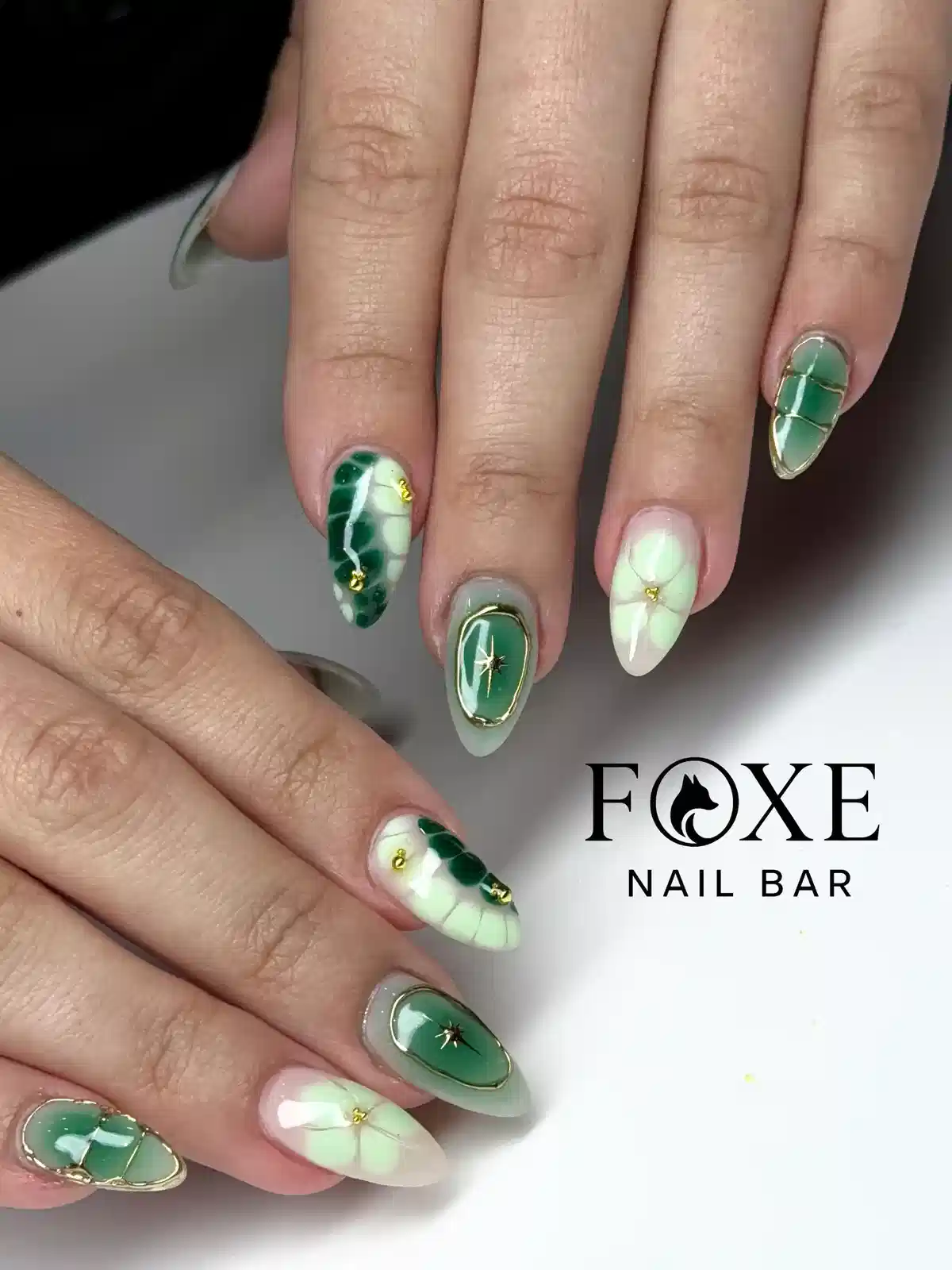 Geometric Green-and-White Panels with Gold Outlines