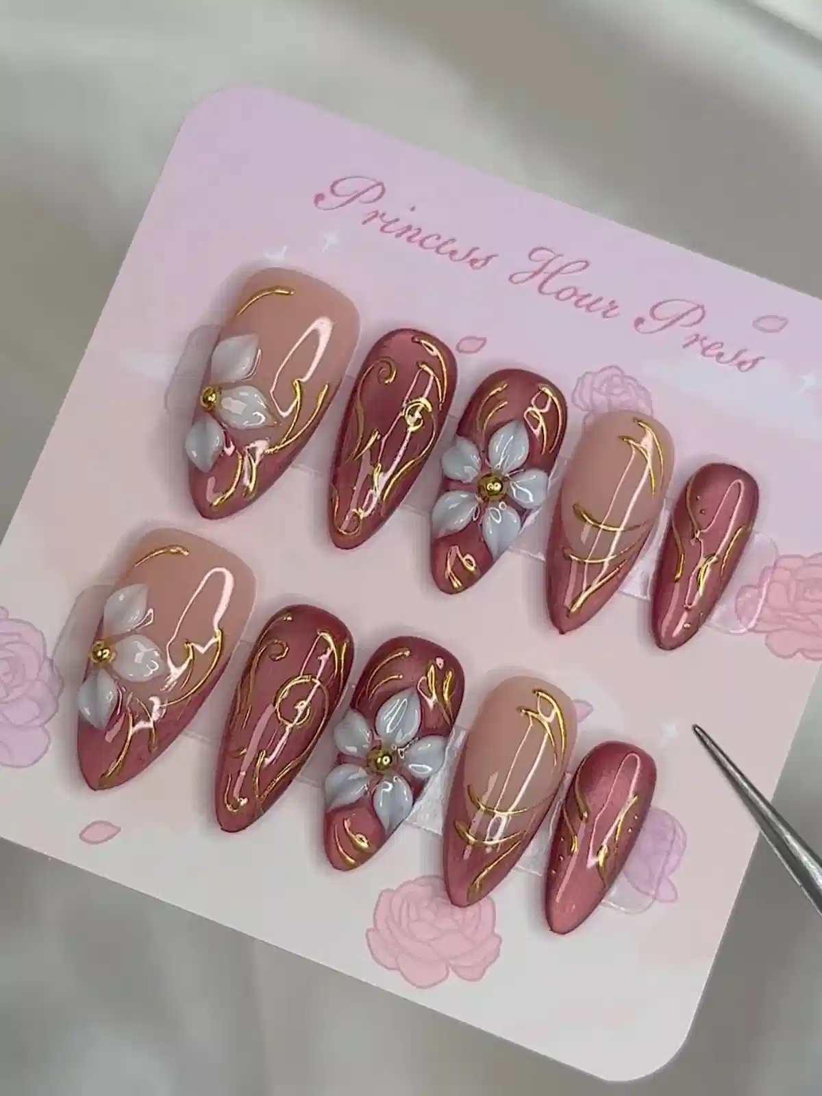 Mauve-and-nude set with gold swirl linework and 3D flowers