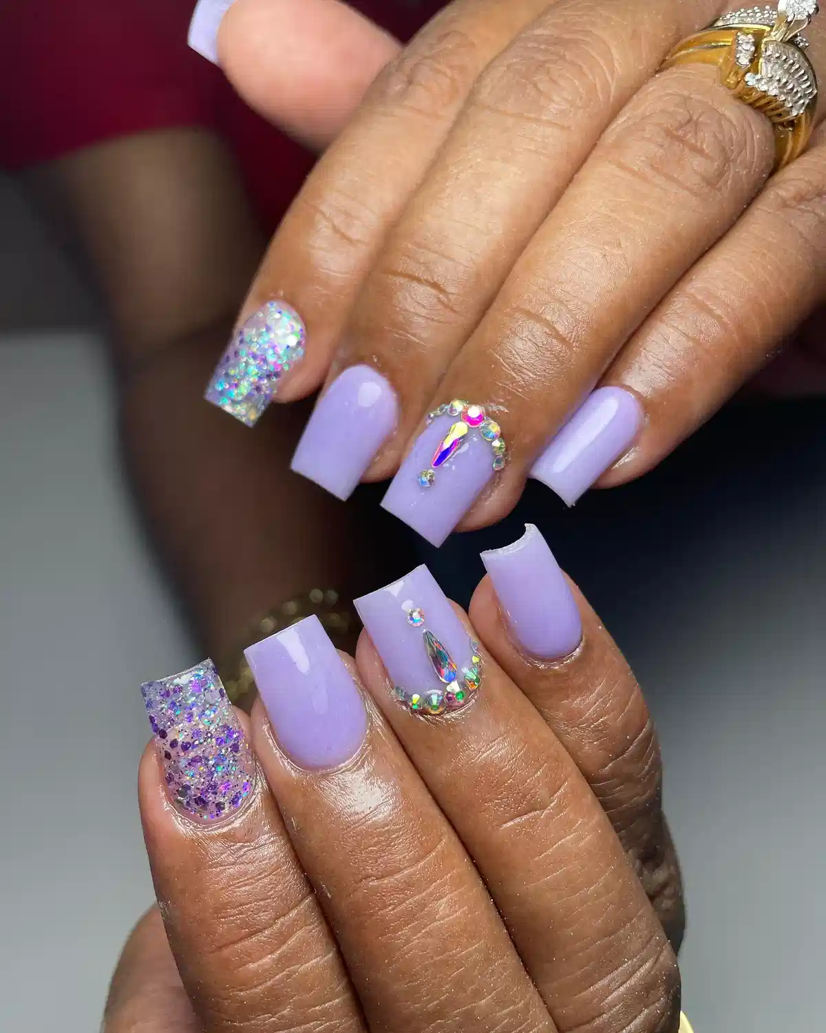 Square pastel lavender with chunky glitter and rhinestone arcs