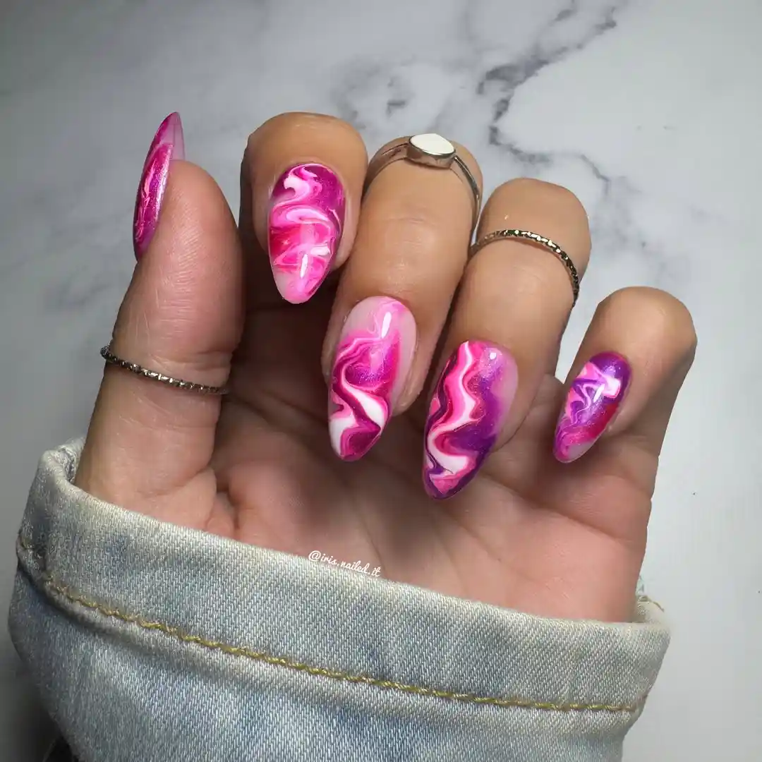Pink-magenta and purple swirl almond nails