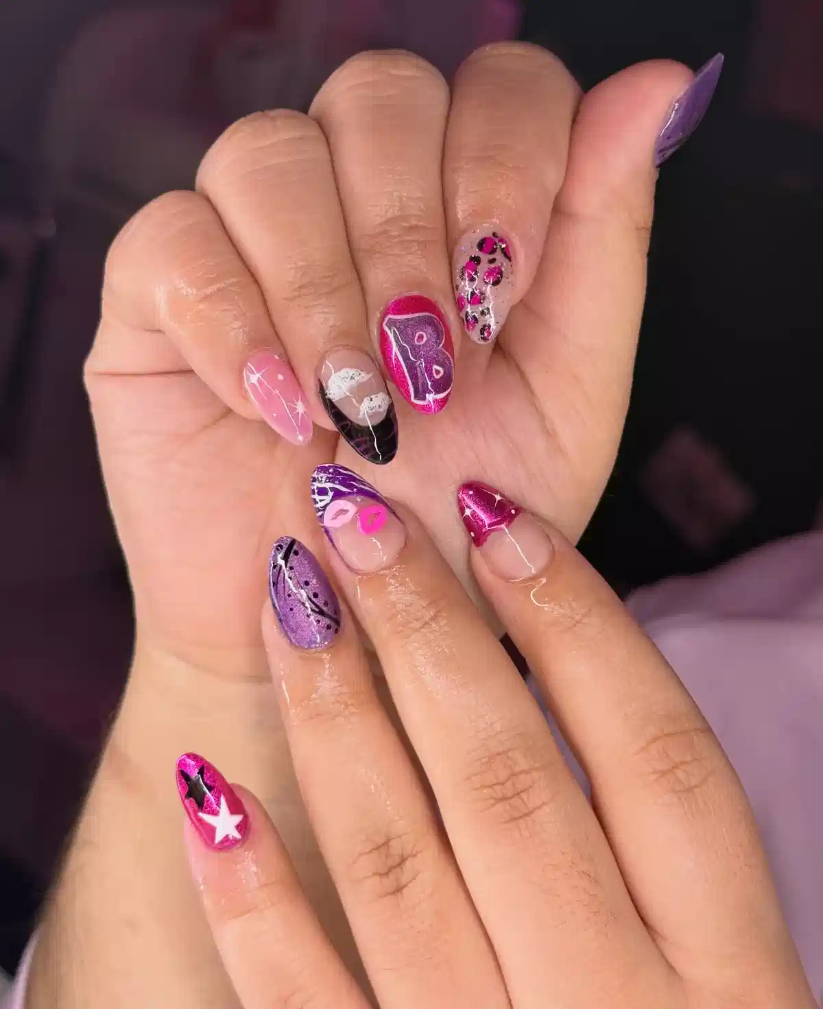 Mixed pink-purple set with letter accent, stars, and speckles