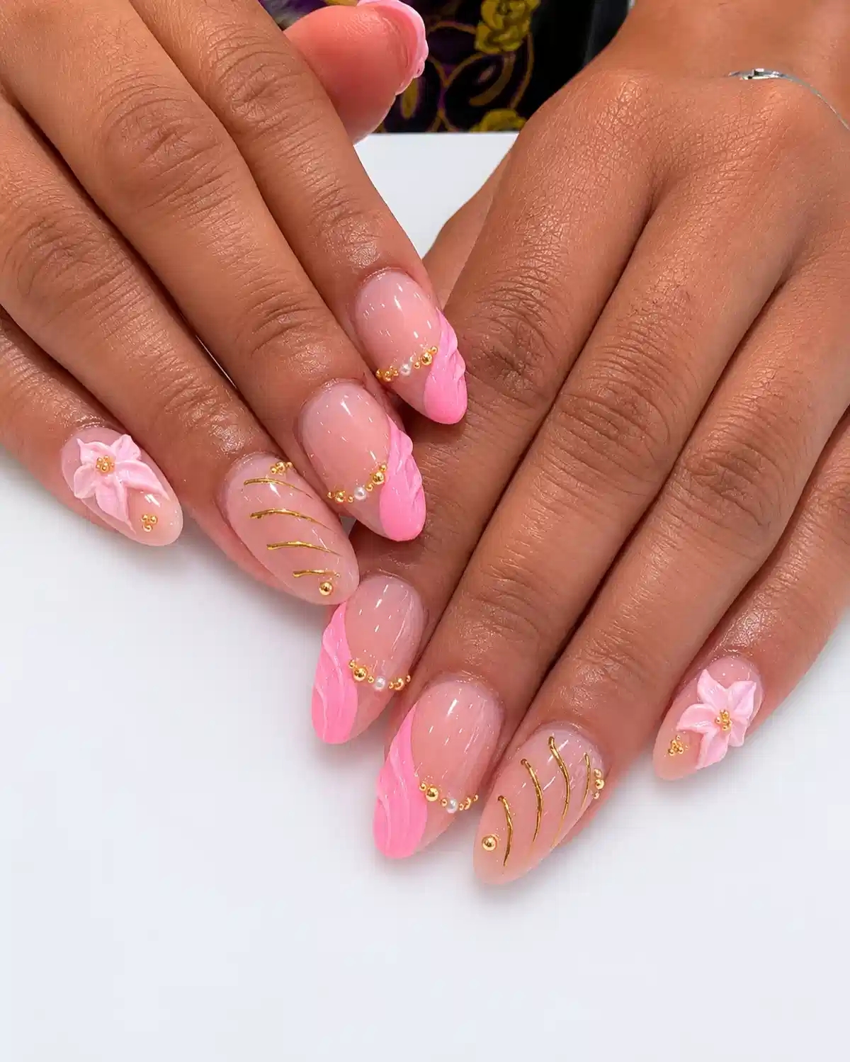 Soft pink ombré tips with gold beads and 3D flowers