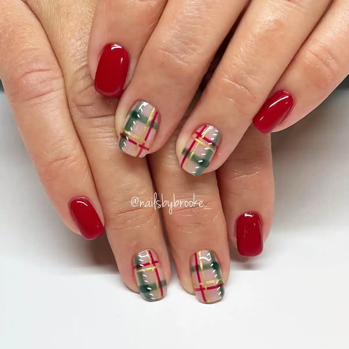 Red solids with beige-and-green plaid accents