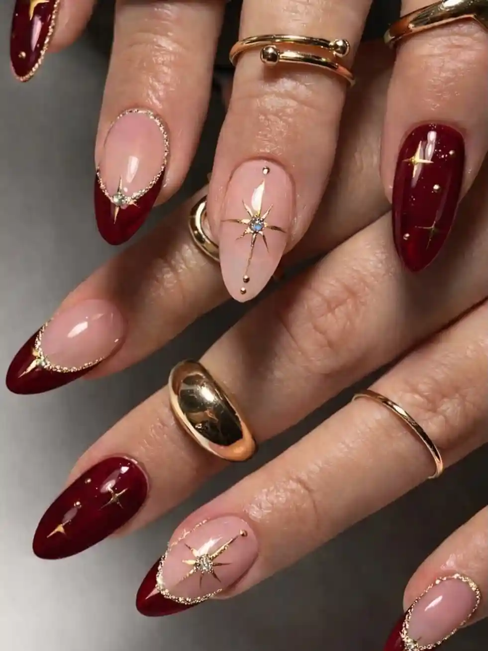 Burgundy and nude with gold starburst accents