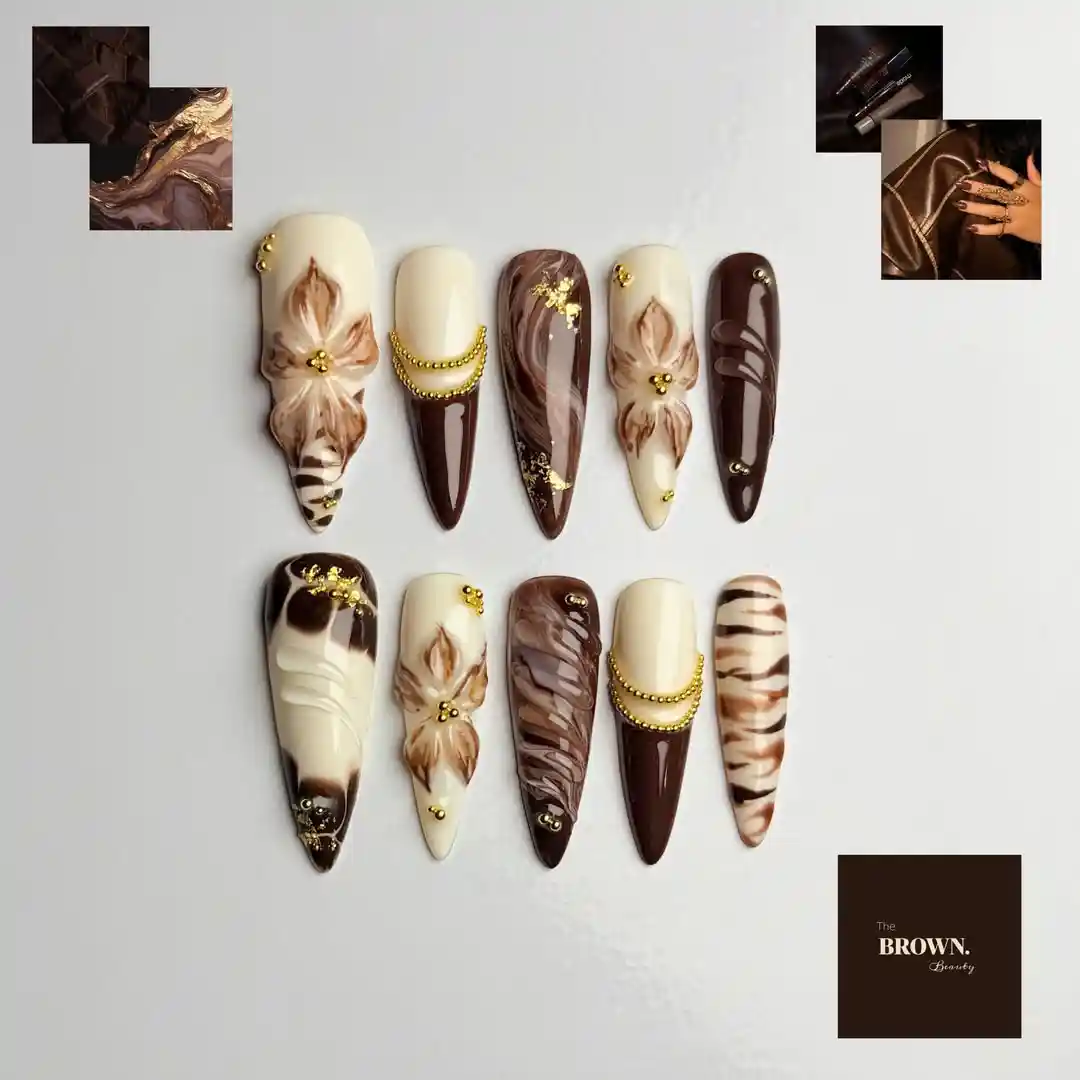 Brown and cream stiletto set with zebra stripes, marbling, and floral accents