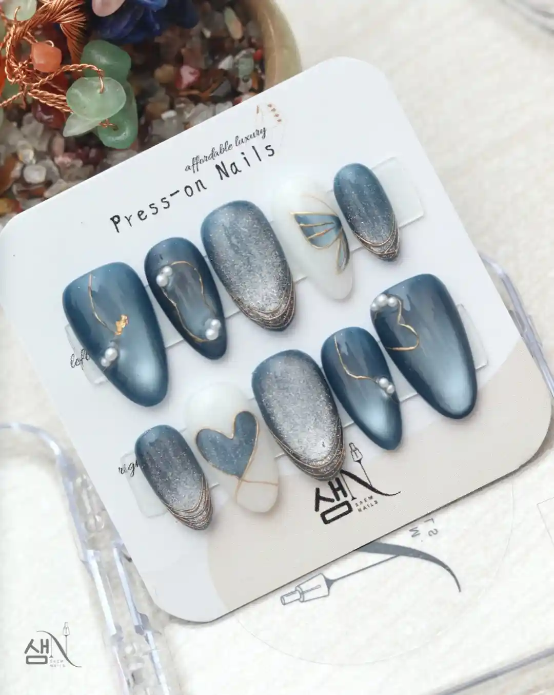 Deep blue set with silver glitter accents and gold line details