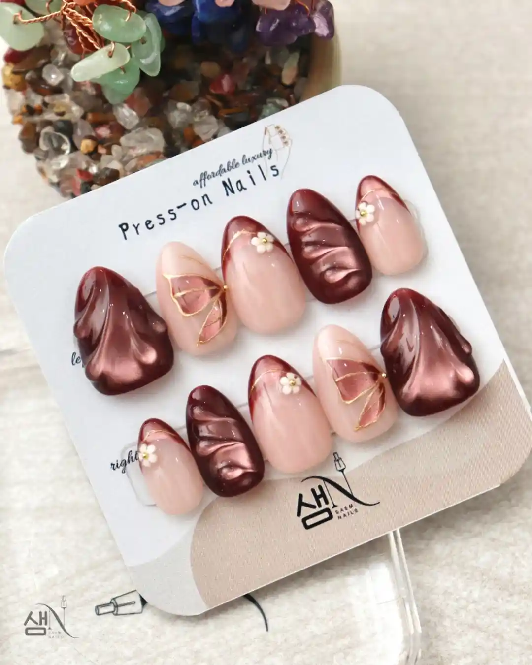 Nude and burgundy set with raised wave texture and small floral accents