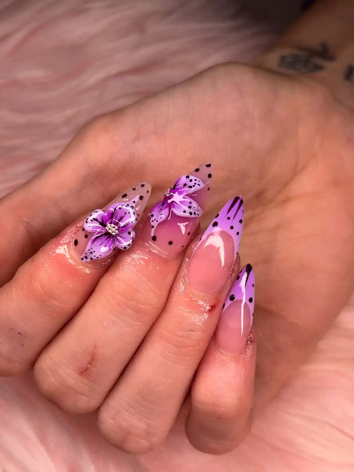 Lavender tips with black dots and butterfly/flower accents