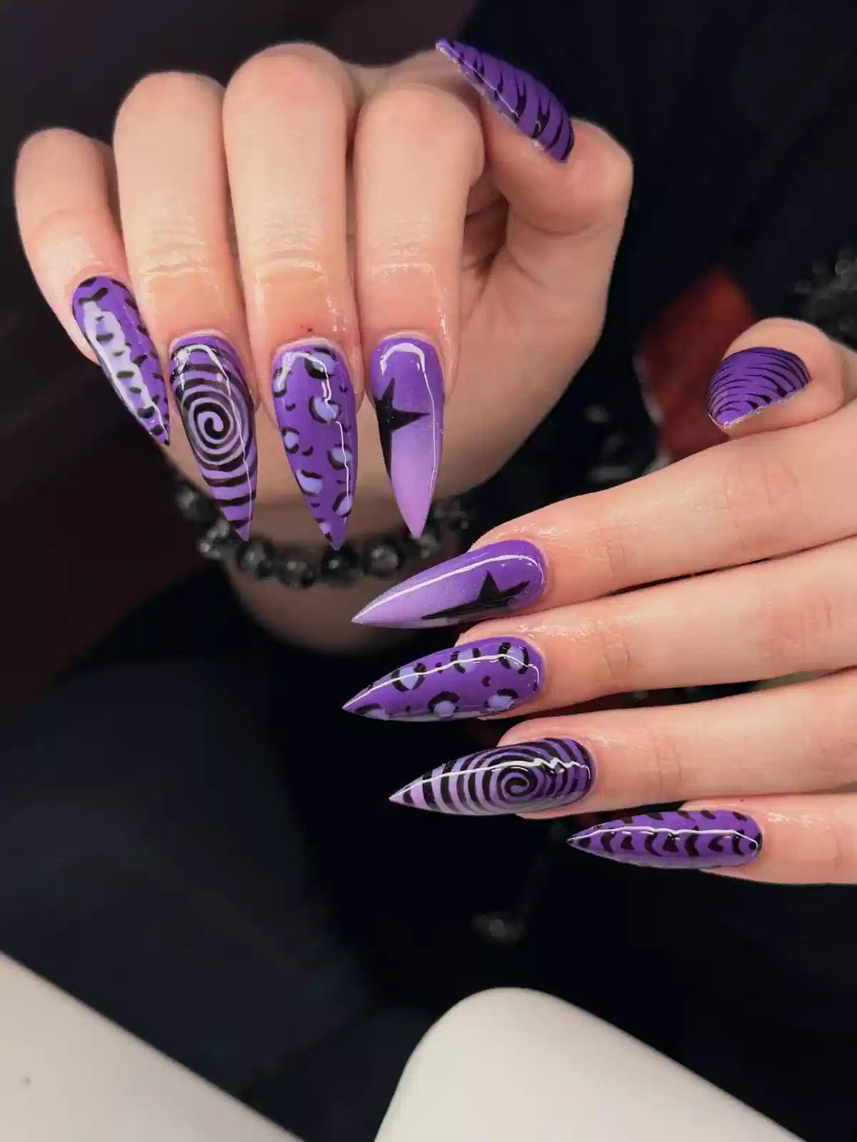 Purple Stilettos with Black Spirals and Star Graphics