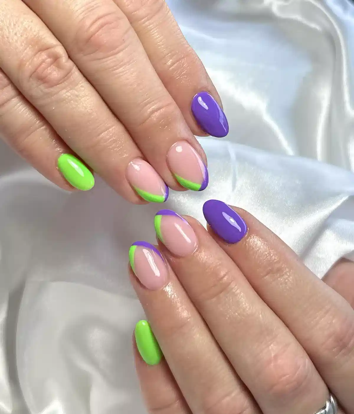 Glossy purple and neon green with double French tips