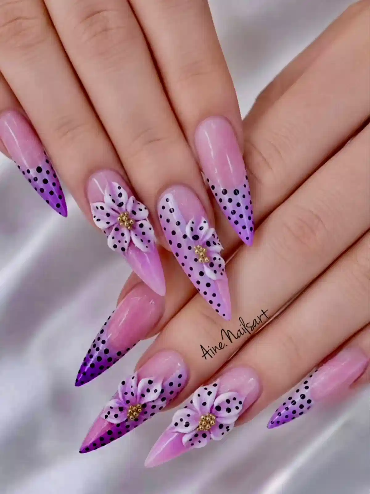 Pink–purple gradient with black polka dots and 3D flowers