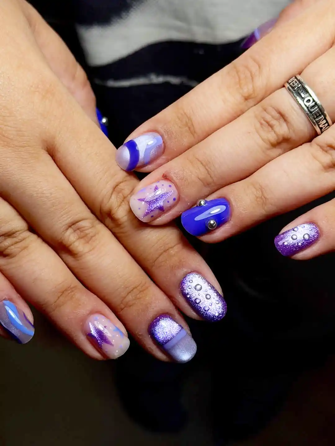 Purple mix-and-match with stars, studs, and sparkle