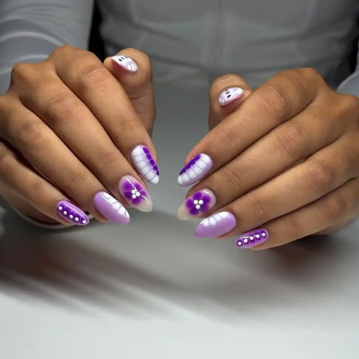 Lavender florals with white-and-purple segmented accents