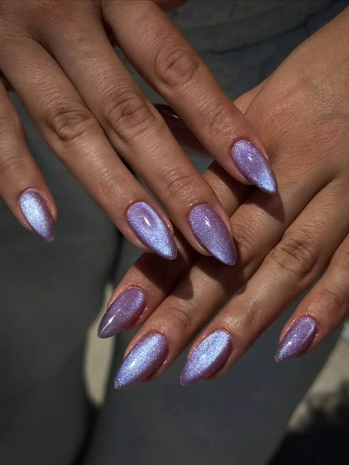 Pale lavender cat-eye shimmer on almond nails