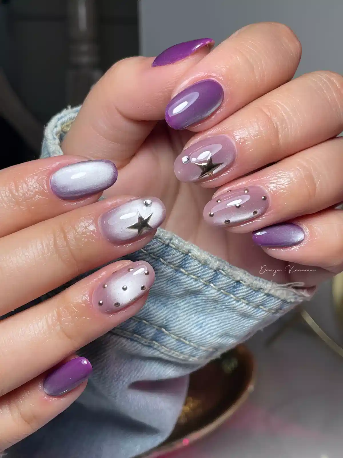 Soft purple cat-eye mix with star charm and stud accents