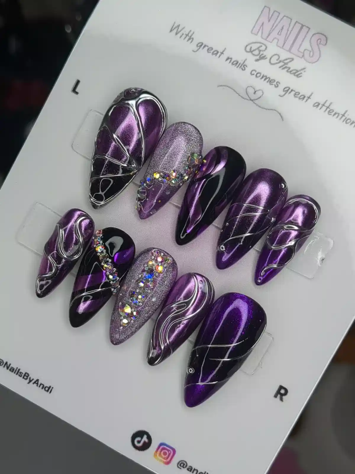 Purple metallic press-on set with silver linework and rhinestone clusters