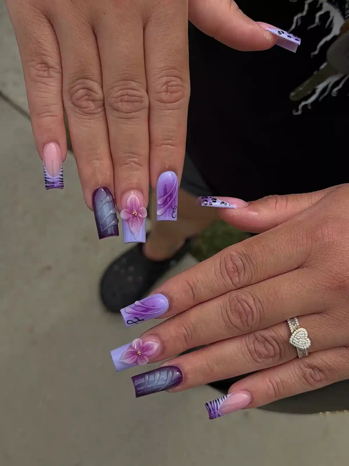 Mixed purple gradients with zebra tips and floral accent