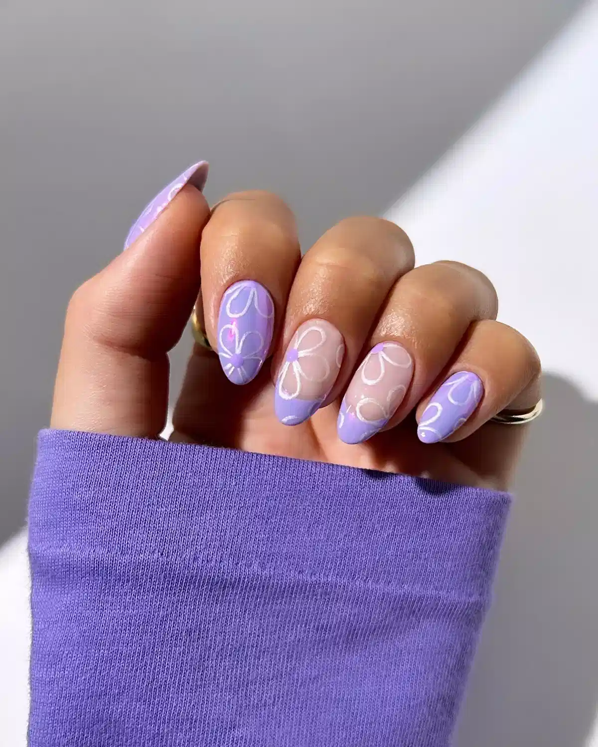 Lavender French Tips with White Floral Outlines