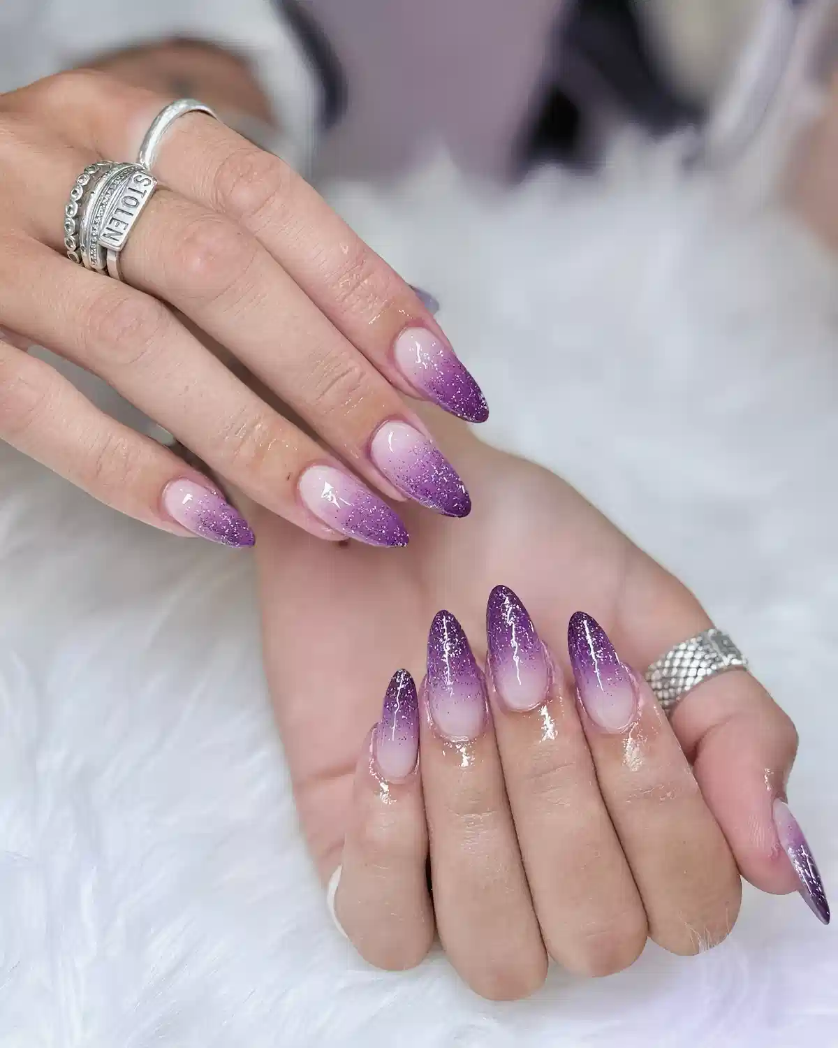 Nude-to-Purple Glitter Ombre Almond Nails