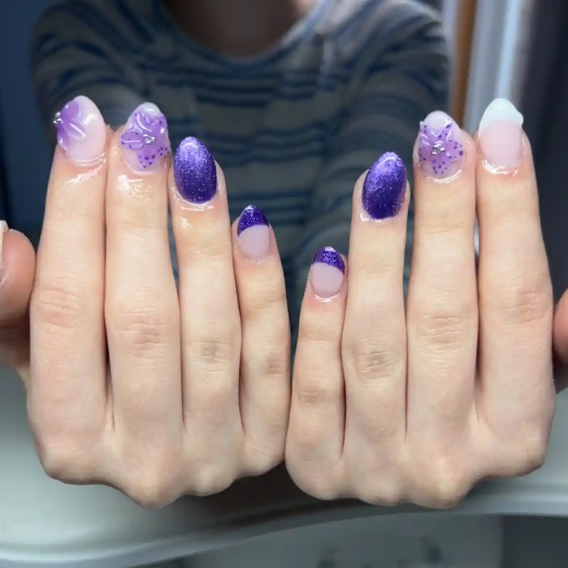 Deep purple glitter tips with butterfly accent nails