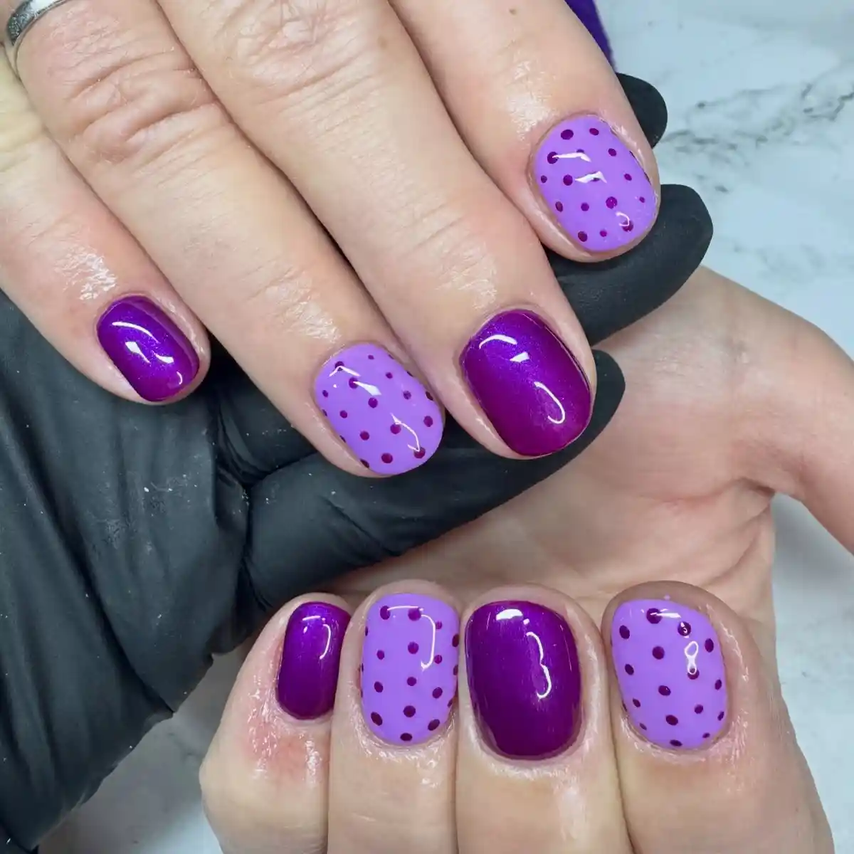 Deep purple and lavender polka-dot short nails