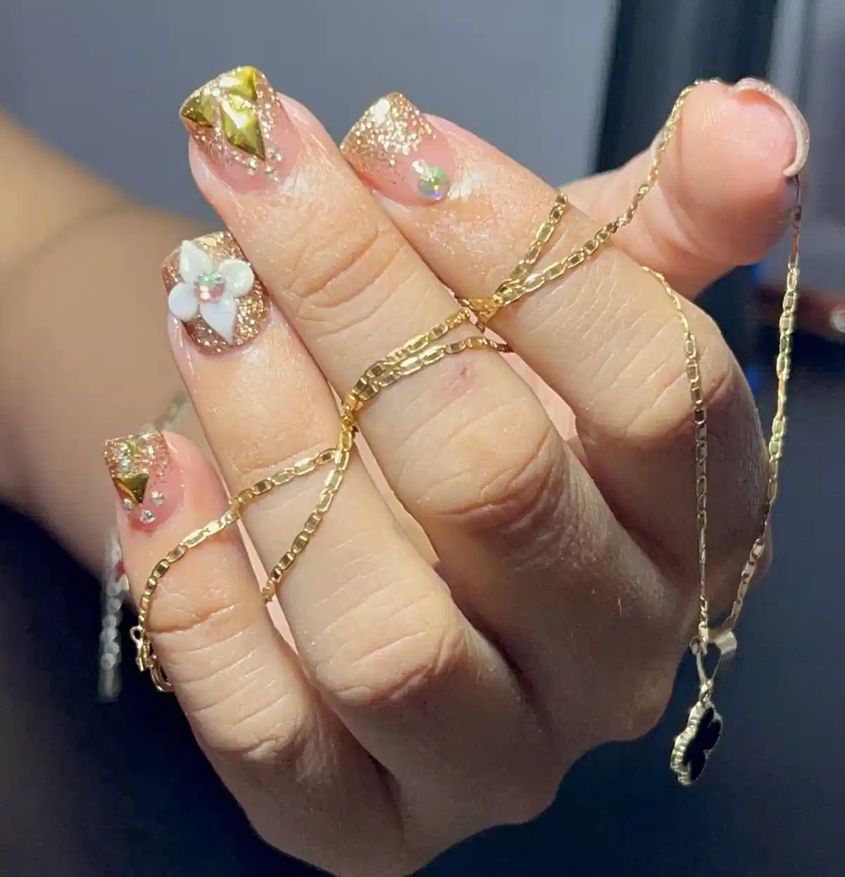 Gold Glitter Nails with 3D Studs and Flower Detail