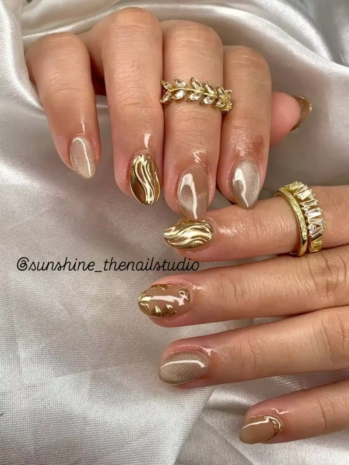 Nude and Champagne Almond Nails with Gold Metallic Accents