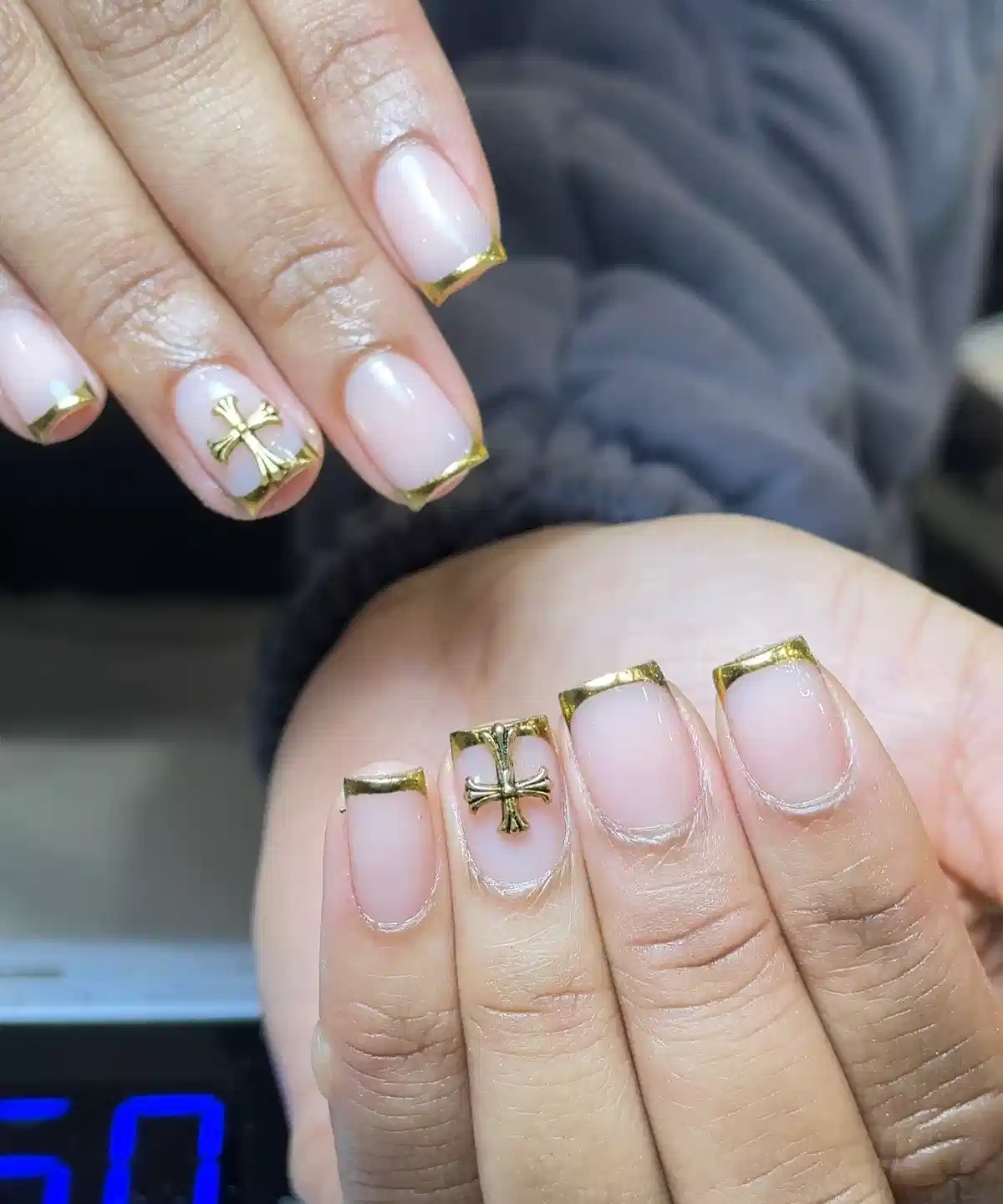 Sheer Pink Nails with Gold Tip Edging and Cross Charm