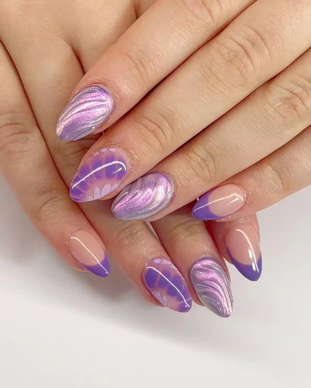 Purple tips with metallic swirl accents