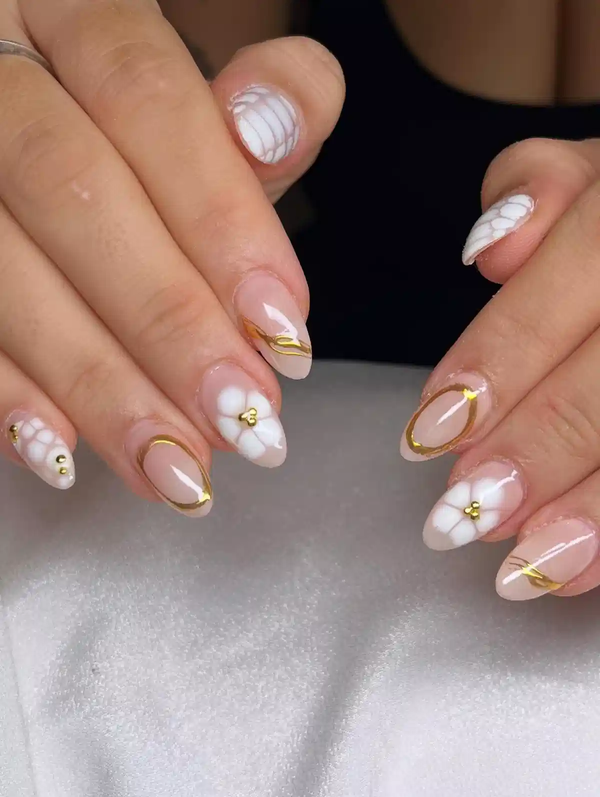 Nude base with gold frames and white 3D florals